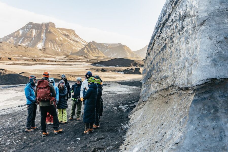 From Vik: Katla Ice Cave and Super Jeep Tour - Inside the Katla Ice Cave: blue ice and ash layers (with real-world cave size)
