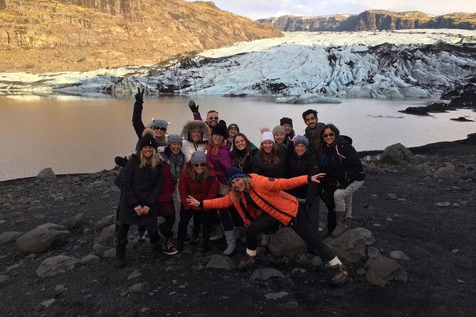 Iceland South Coast Full Day Small-Group Tour from Reykjavik - Sólheimajökull glacier walk: ash-striped ice and rocky terrain