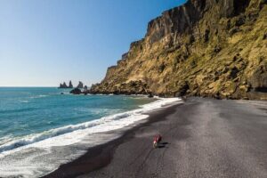 Katla Ice Cave & South Coast Waterfalls Tour From Reykjavík - Katla Ice Cave: safety gear, super-jeep ride, and the photo reality check