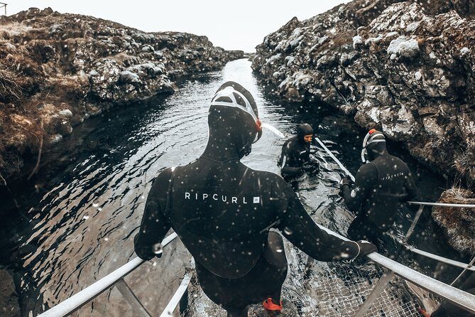 Lava Tunnel Caving & Snorkeling in Silfra with Transfer | Free Photos - What to Wear and Pack for Cave + Cold Water