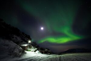 Northern Lights Minibus Tour with Hot Cocoa, Blankets & Photos - How guides hunt auroras: KP index plus cloud cover decisions