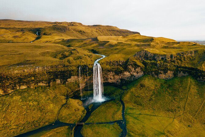 Private South Coast Fire and Ice: Glacier viewpoint & Lava Show - South Coast stops, in order: Skógafoss, black beach, Vík and the Lava Show