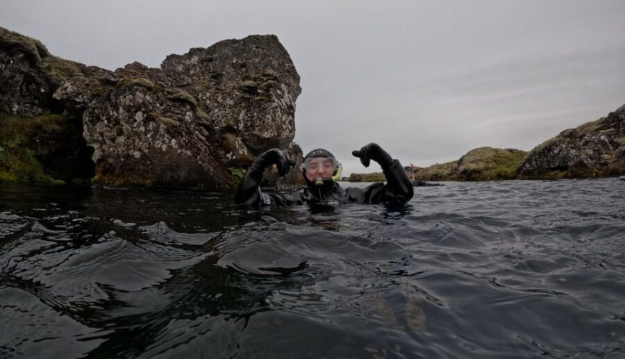 Silfra: Fissure Snorkeling Tour with Underwater Photos - Photos, hot drinks, and that heated-change perk